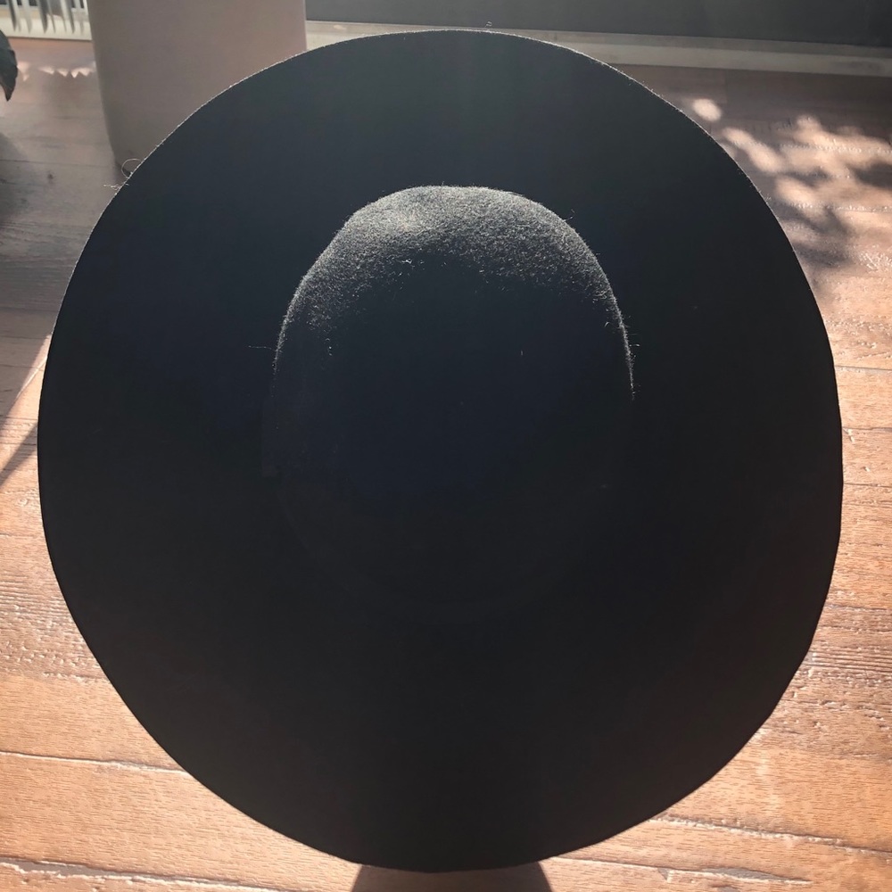 Wide brimmed black hat